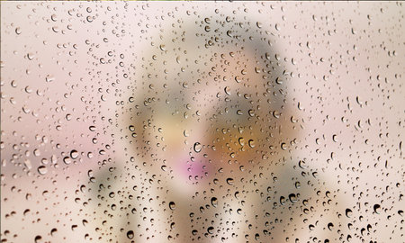 Background with rain drops close up. Rain drops on outdoor window, Closeup view transparent water drops on glass surface, humid water backdrop, blurred background with copy space for your textの写真素材