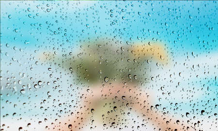 Background with rain drops close up. Rain drops on outdoor window, Closeup view transparent water drops on glass surface, humid water backdrop, blurred background with copy space for your textの写真素材