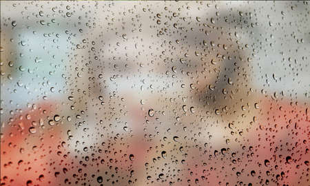 Background with rain drops close up. Rain drops on outdoor window, Closeup view transparent water drops on glass surface, humid water backdrop, blurred background with copy space for your textの写真素材