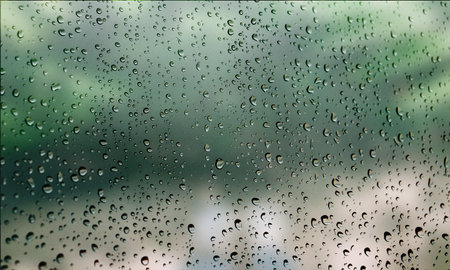 Background with rain drops close up. Rain drops on outdoor window, Closeup view transparent water...
