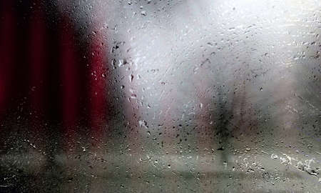Background with rain drops close up. Rain drops on outdoor window, Closeup view transparent water...