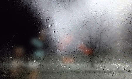 Background with rain drops close up. Rain drops on outdoor window, Closeup view transparent water...