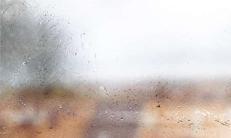 Background with rain drops close up. Rain drops on outdoor window, Closeup view transparent water drops on glass surface, humid water backdrop, blurred background with copy space for your textの写真素材