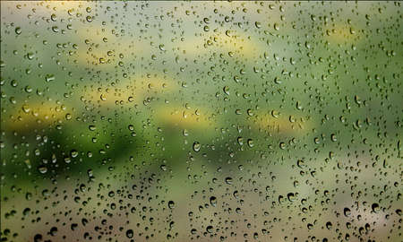 Background with rain drops close up. Rain drops on outdoor window, Closeup view transparent water...