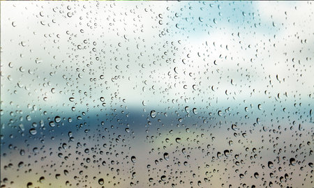 Background with rain drops close up. Rain drops on outdoor window, Closeup view transparent water...