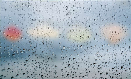 Background with rain drops close up. Rain drops on outdoor window, Closeup view transparent water...