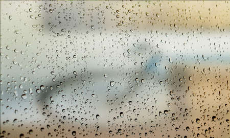 Background with rain drops close up. Rain drops on outdoor window, Closeup view transparent water...