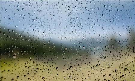 Background with rain drops close up. Rain drops on outdoor window, Closeup view transparent water...