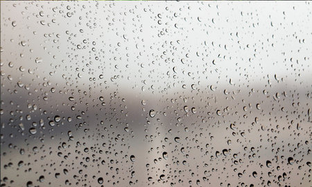 Background with rain drops close up. Rain drops on outdoor window, Closeup view transparent water...