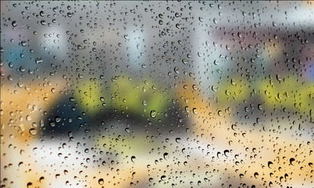 Background with rain drops close up. Rain drops on outdoor window, Closeup view transparent water...