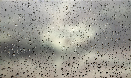 Background with rain drops close up. Rain drops on outdoor window, Closeup view transparent water...