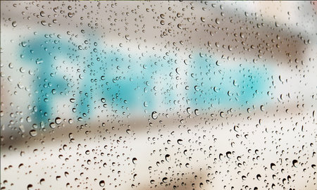 Background with rain drops close up. Rain drops on outdoor window, Closeup view transparent water...