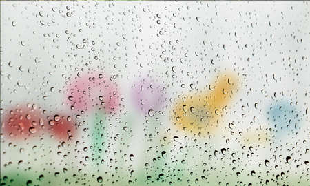 Background with rain drops close up. Rain drops on outdoor window, Closeup view transparent water...