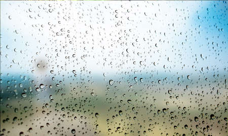 Background with rain drops close up. Rain drops on outdoor window, Closeup view transparent water...