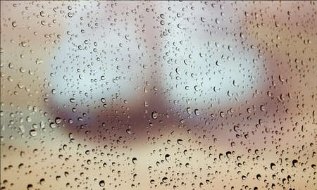 Background with rain drops close up. Rain drops on outdoor window, Closeup view transparent water...