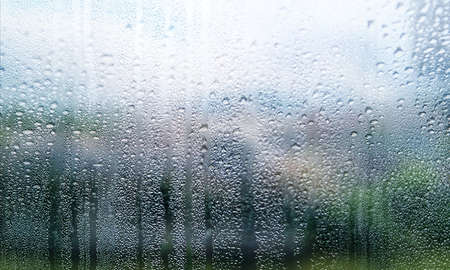 Water drops on the glass. Rain drops on the window, abstract background
