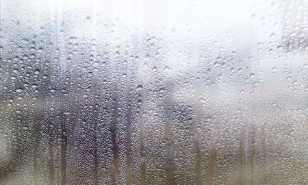 Water drops on the glass, condensation on the window, natural background
