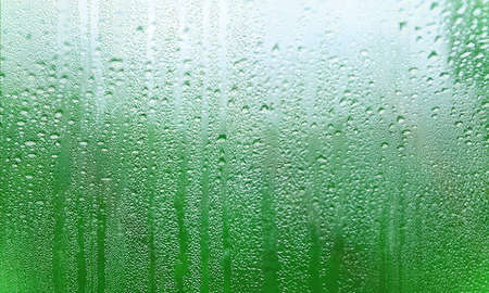 Rain drops on the window. Raindrops on the window. Natural background.の写真素材