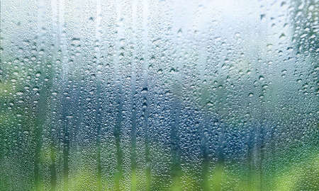 Water drops on the window. Rain drops on the window glass.