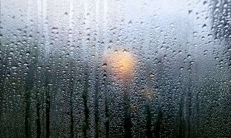 Water drops on the glass. Raindrops on the window, natural background