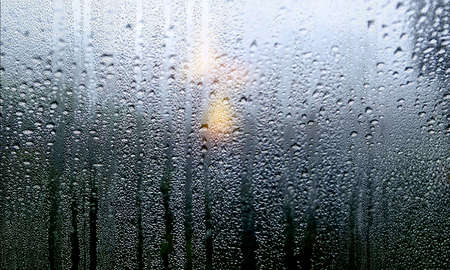 Rain drops on the window, natural background. Raindrops on the window.