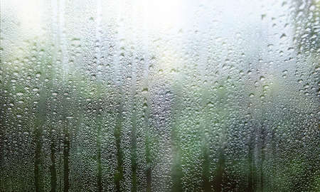 Water drops on the glass. Raindrops on the window. Natural background.