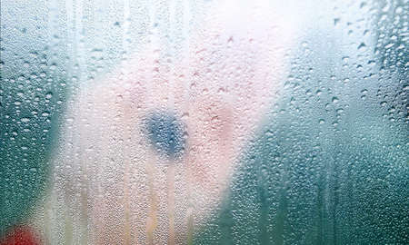 Condensation on the window, close-up. Rain drops on the window.