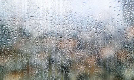 Background with rain drops close up. Rain drops on outdoor window, Closeup view transparent water...