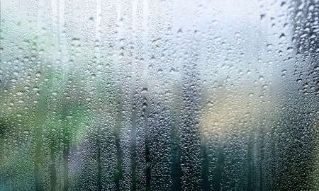 Condensation on the window. Rain drops on the glass. Rainy weather.