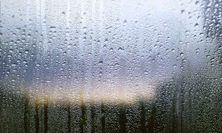 Rain drops on the window. Raindrops on the window. Natural background.