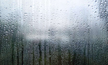 Rain drops on the window. Raindrops on the window. Natural background.