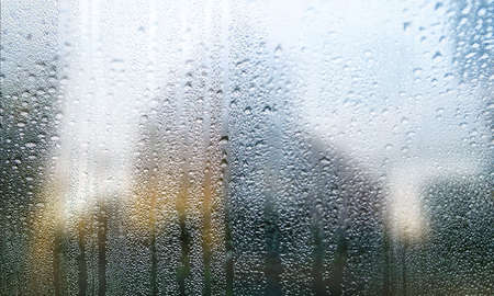 Condensation on the glass, close-up. Rain drops on the window.
