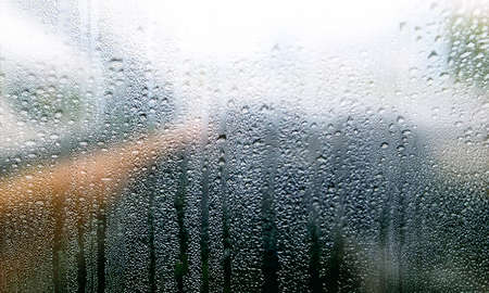 Drops of rain on the window. Rain drops on the glass.