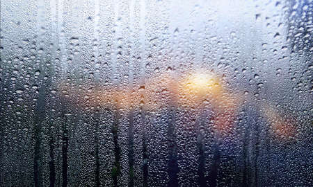 Water drops on window glass. Raindrops on window glass after rain.
