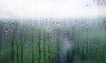 Water drops on the glass. Raindrops on the window, close-up
