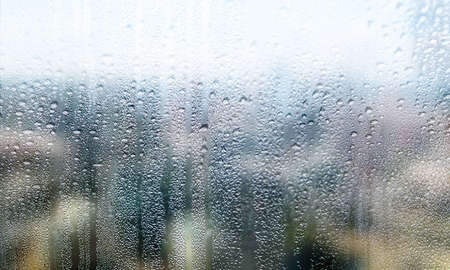 Condensation on the window. Rain drops on the glass. Selective focus.