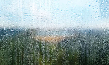 Water drops on the window, natural background. Raindrops on the window.
