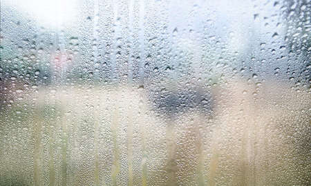 Background with rain drops close up. Rain drops on outdoor window, humid water backdrop, blurred...