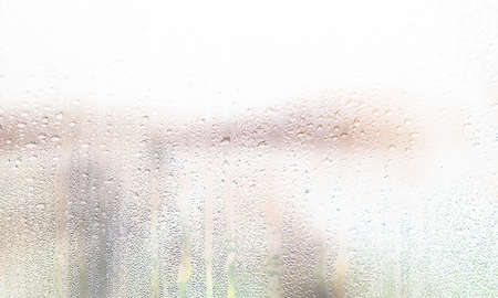 Condensation on the window. Water drops on the glass. Abstract background