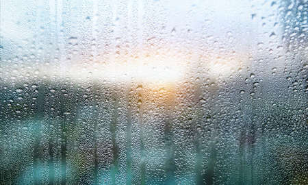 Water drops on the window. Raindrops on the glass. Rainy weather.