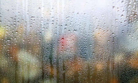 Condensation on the window. Rain drops on the window. Abstract background.の写真素材