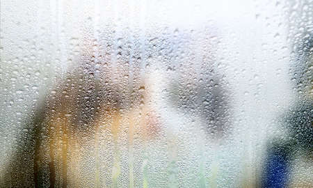 Background with rain drops close up. Rain drops on outdoor window, Closeup view transparent water...