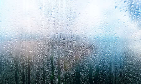 Condensation on the window. Raindrops on the window glass.