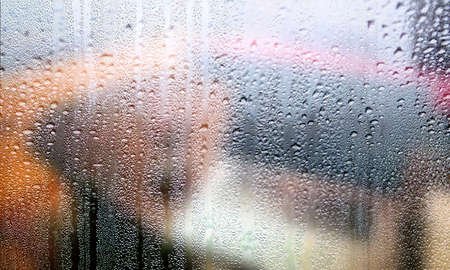 Condensation on the window. Rain drops on the glass. Close-up.