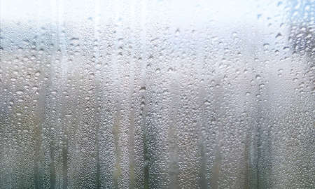 Close up of condensation on the window. Rainy day.の写真素材