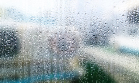 Drops of rain on the window, shallow depth of field.