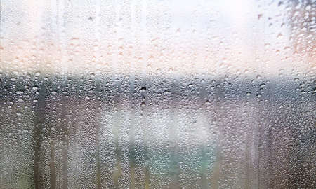 Rain drops on the window. Raindrops on the glass, natural background