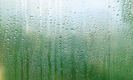 Condensation on the window glass. Rain drops on the window.