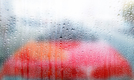 Condensation on the window with a blurred background. Close-up