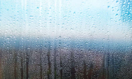 Rain drops on the window, abstract background with copy space for text